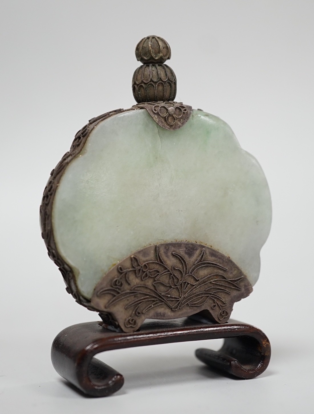 A Chinese jadeite and silver filigree mounted snuff bottle, 20th century